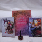 Three books and one black candle
